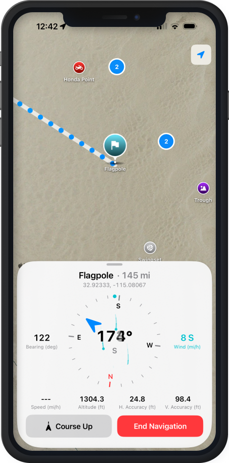 Glamis Guide navigating to Flagpole: a straight dotted line across the aerial map, with a compass card showing bearing, wind, speed, and altitude